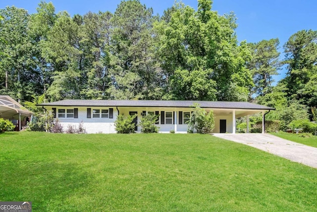 single story home with a front lawn and a carport