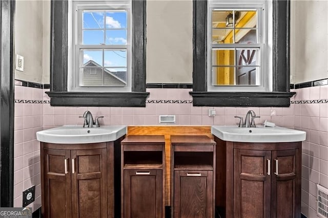 living area featuring tile patterned flooring and crown molding