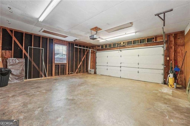 garage featuring a garage door opener