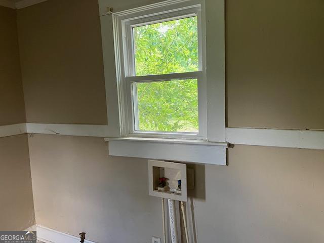 laundry room featuring plenty of natural light and washer hookup