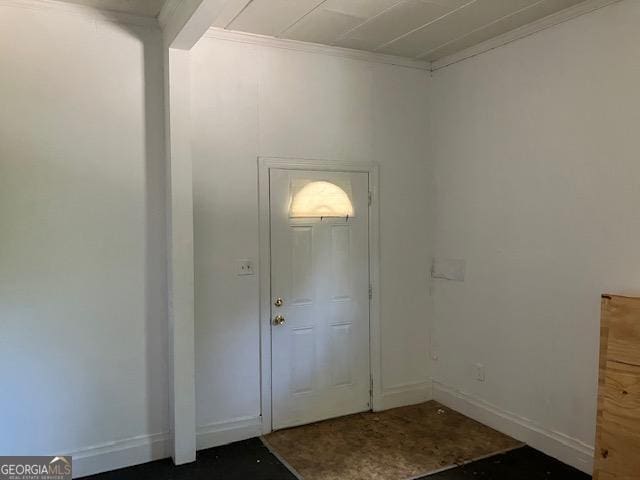 entryway featuring ornamental molding