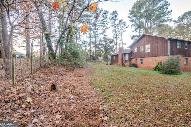 view of yard featuring central AC