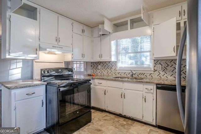 kitchen with white cabinetry, sink, and appliances with stainless steel finishes