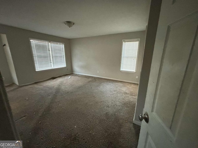 5830 Burdett Rdg, Atlanta, GA 30349 - spare room featuring carpet