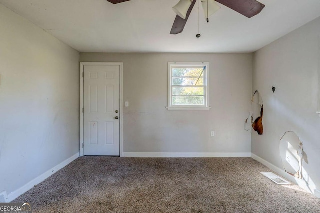 unfurnished room featuring carpet flooring and ceiling fan