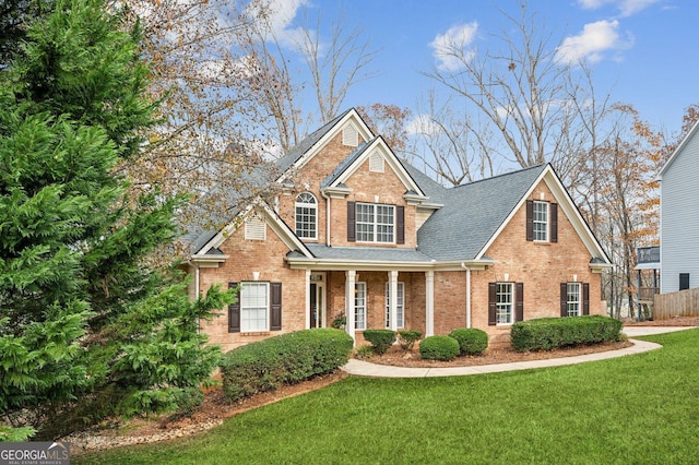 view of front of home with a front yard