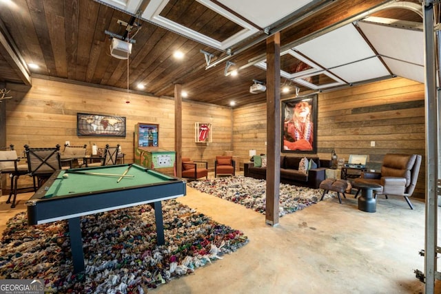 recreation room featuring concrete floors, wood ceiling, wood walls, and billiards