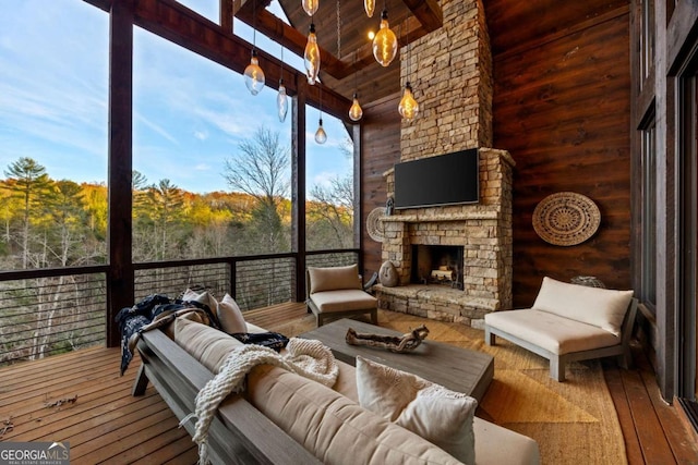 interior space featuring an outdoor stone fireplace