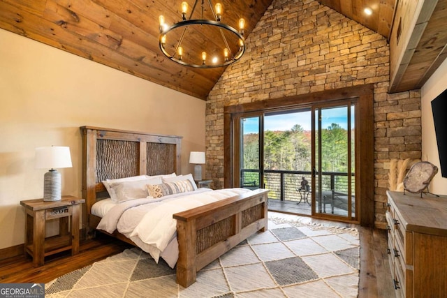 bedroom featuring light hardwood / wood-style floors, access to exterior, wooden ceiling, and high vaulted ceiling