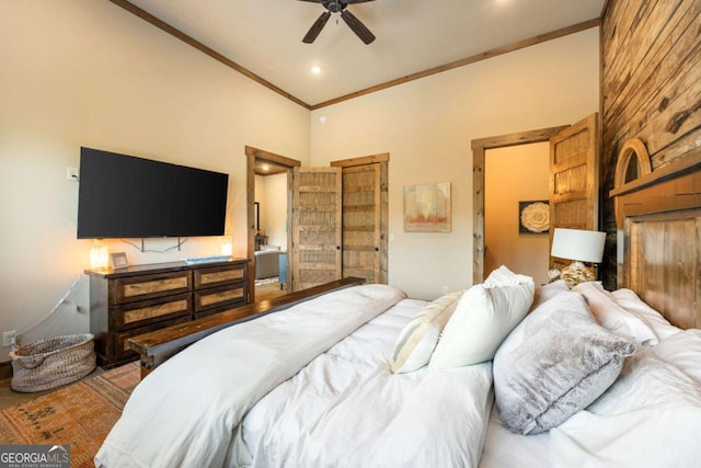 bedroom with ceiling fan, crown molding, and a high ceiling