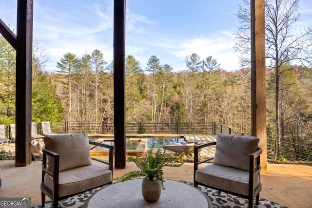 view of patio with a pool