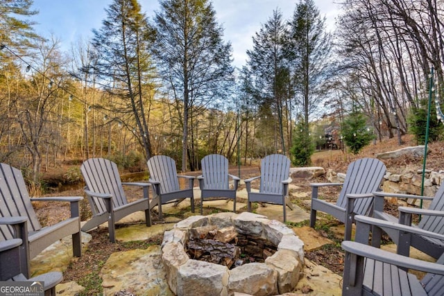 view of patio / terrace featuring a fire pit