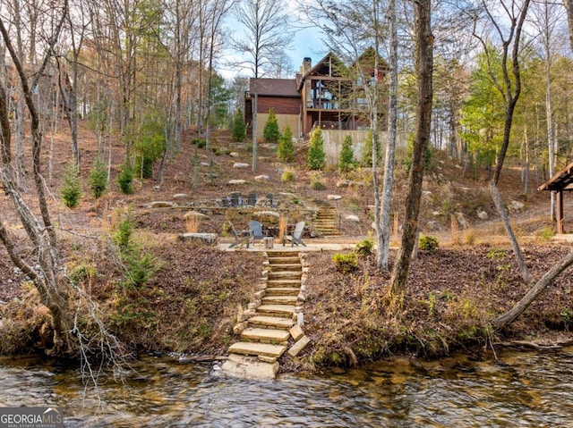 view of yard with a water view