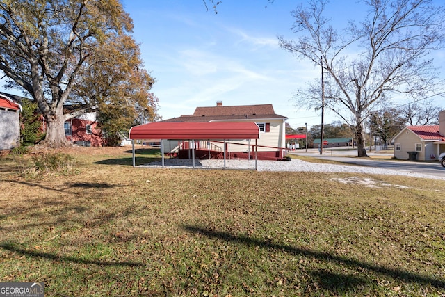 view of yard with a carport