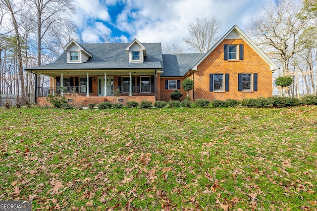 view of front facade featuring a porch and a front yard