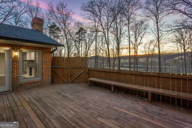 new england style home with a sunroom and a front yard