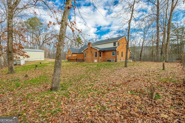 view of yard featuring central AC