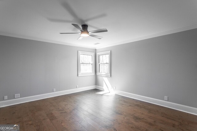 unfurnished dining area with ornamental molding and dark wood-type flooring