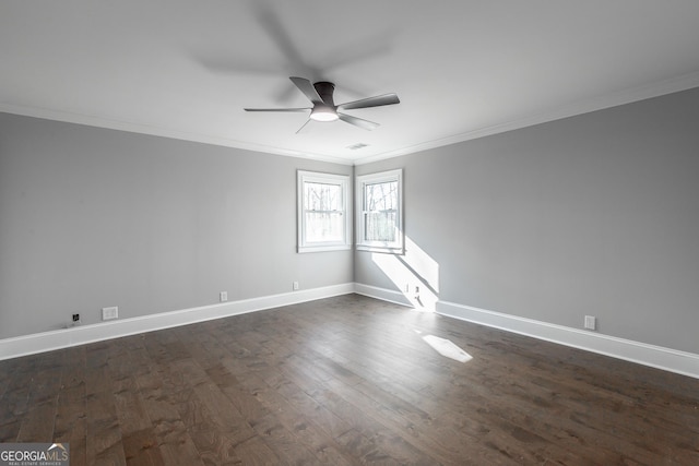 spare room with dark hardwood / wood-style floors, ceiling fan, and ornamental molding