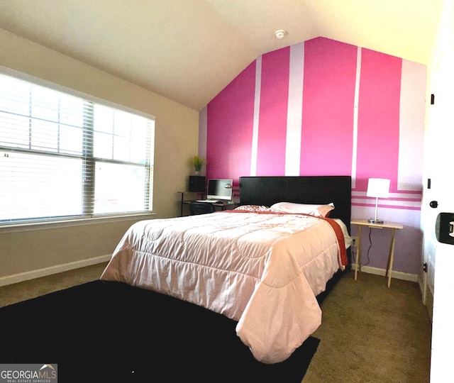 bedroom with baseboards, carpet flooring, and vaulted ceiling