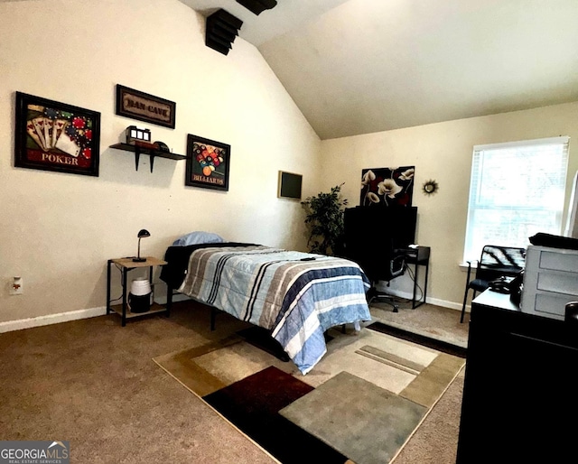 bedroom featuring baseboards, carpet floors, and vaulted ceiling