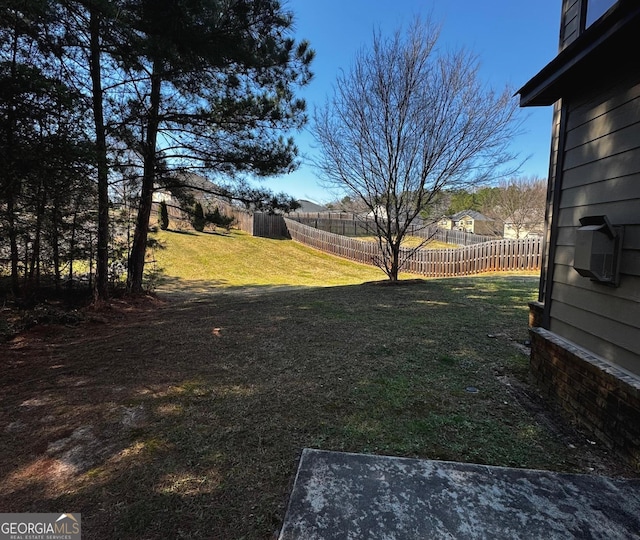 view of yard featuring fence