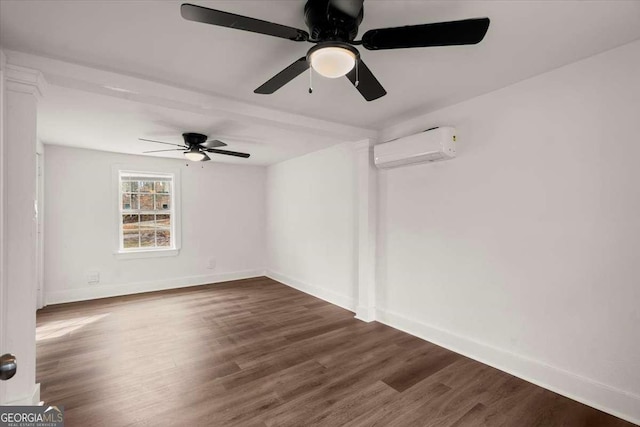 empty room with dark hardwood / wood-style floors, a wall unit AC, and ceiling fan