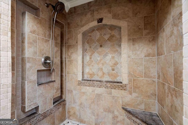 bathroom featuring a tile shower