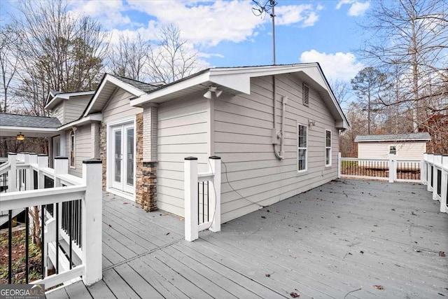 deck featuring a storage unit