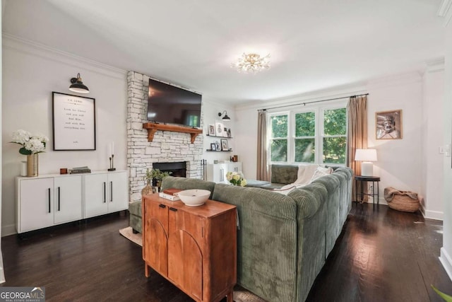 living room featuring a fireplace, dark hardwood / wood-style floors, and ornamental molding