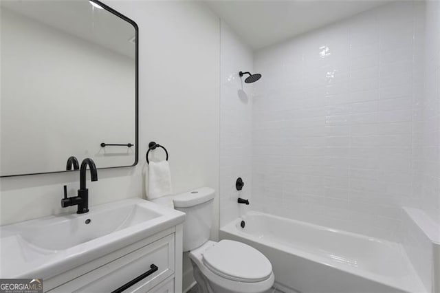 full bathroom with shower / washtub combination, vanity, and toilet