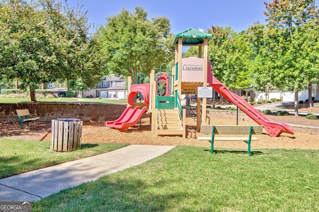 view of play area featuring a lawn