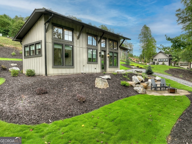 view of property exterior with a yard