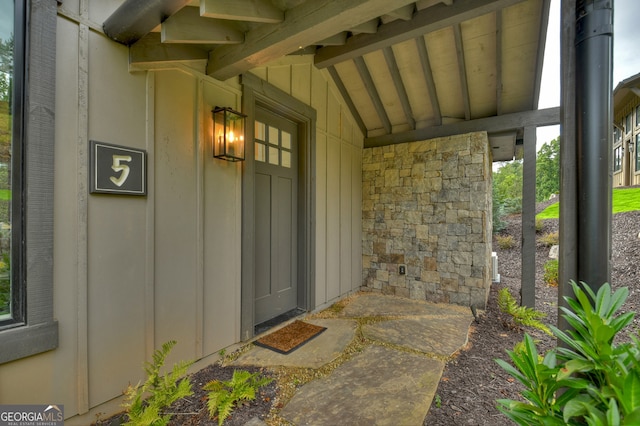 entrance to property with covered porch