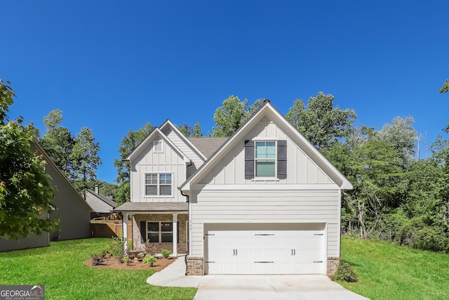 view of front facade featuring a garage and a front lawn