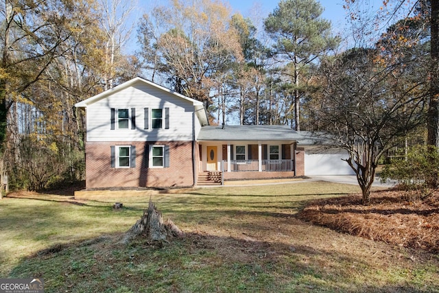 view of front of home with covered porch and a front yard