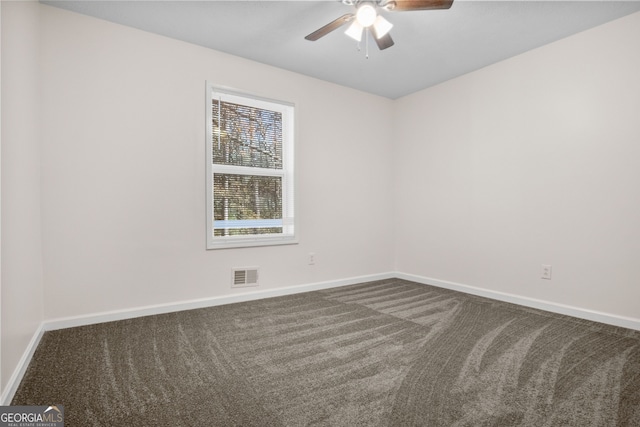 unfurnished room featuring carpet floors and ceiling fan