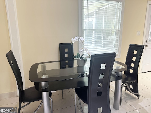 view of tiled dining space