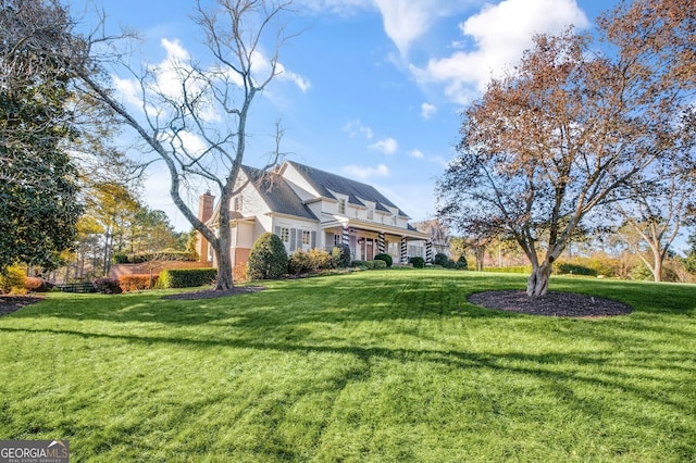 view of front facade with a front yard