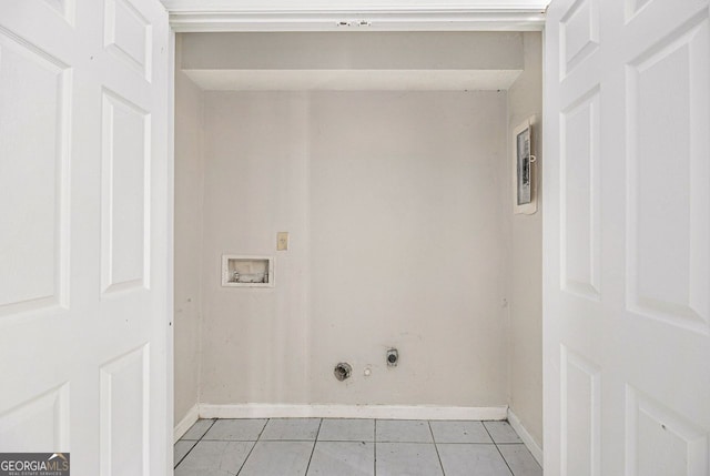 laundry room featuring light tile patterned floors, laundry area, baseboards, hookup for a gas dryer, and washer hookup