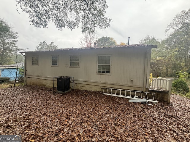 view of property exterior featuring central AC