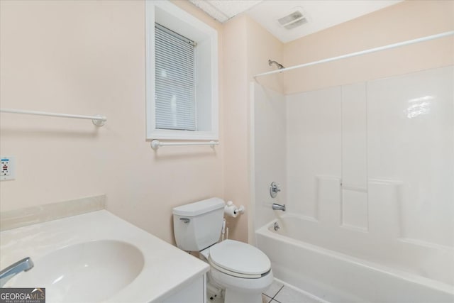 full bathroom with tile patterned floors, shower / bathtub combination, toilet, and sink