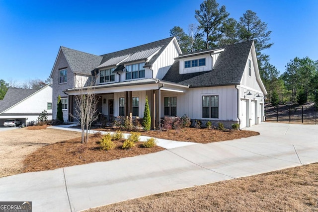 modern farmhouse style home featuring covered porch