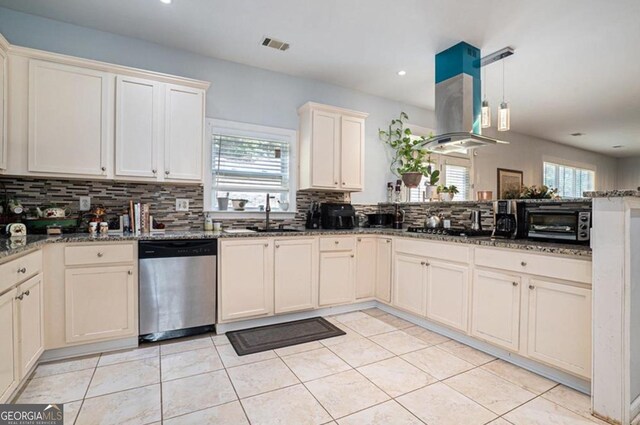 kitchen with black gas stovetop, stainless steel dishwasher, tasteful backsplash, stone countertops, and island exhaust hood