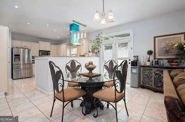 dining room featuring a chandelier