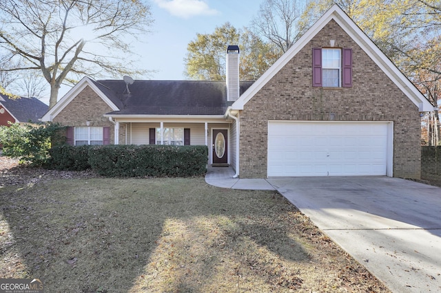 front of property with a front lawn and a garage