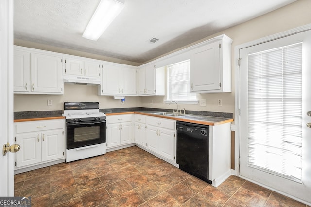 kitchen with white cabinets, white gas stove, dishwasher, and sink