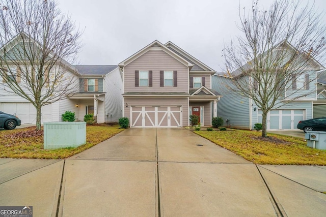 view of front of property with a garage