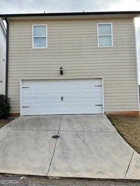 exterior space featuring a garage