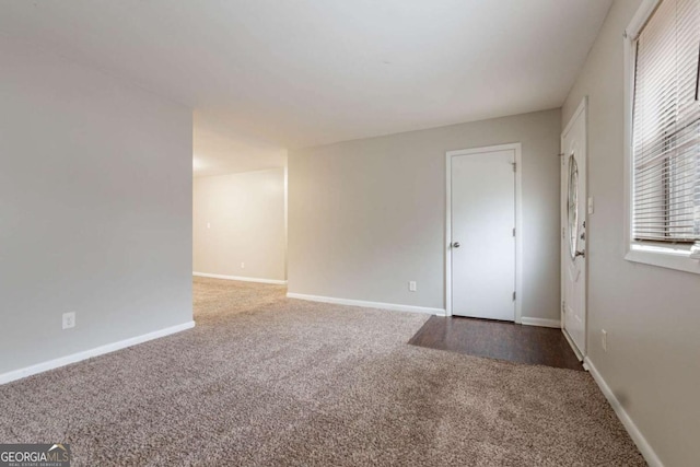 spare room featuring carpet flooring